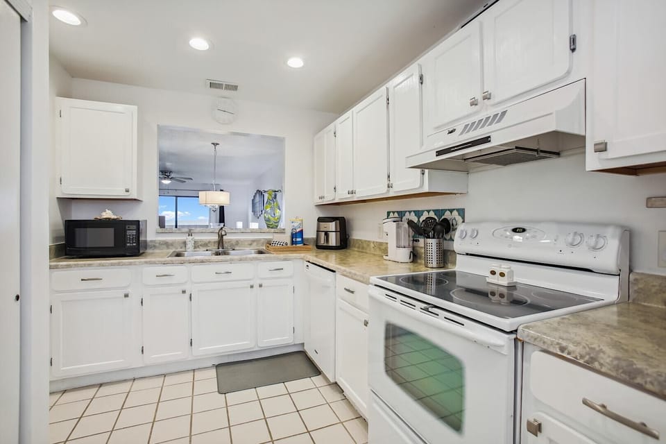 Condo, Multiple Beds, Patio, Ocean View (Sea Haven 513) | Private kitchen | Coffee/tea maker