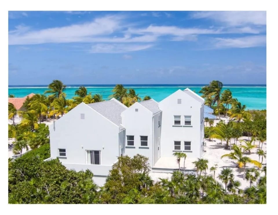 View of the house facing the ocean and beach.