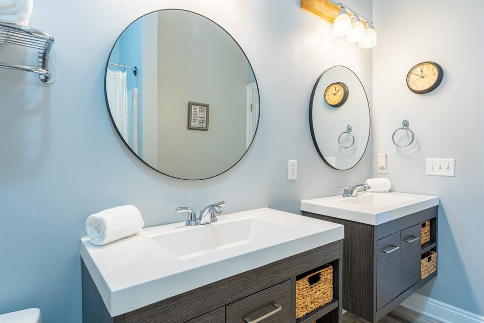 En-suite Bathroom - 2nd floor - Queen room with bunk bed. Double the style, double the function. This modern bath setup makes getting ready a breeze.