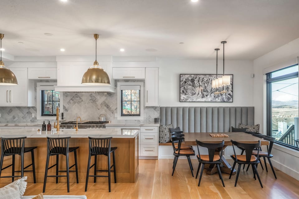 Fully Equipped, Spacious Kitchen with adjacent Dining Table and Seating at the Bar + Wine Fridge