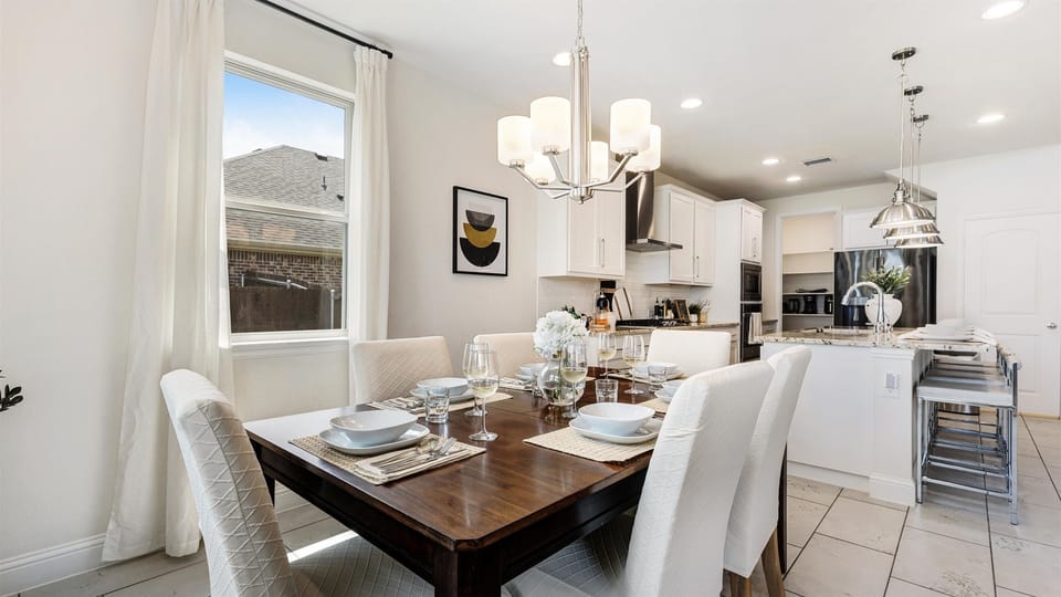Enjoy meals together at the dining area with seating for the whole group perfect for family dinners or brunch before exploring Dallas & Rockwall. 