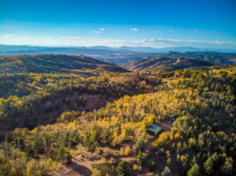 Forested peaks and quiet valley views surround the property—serene escape.