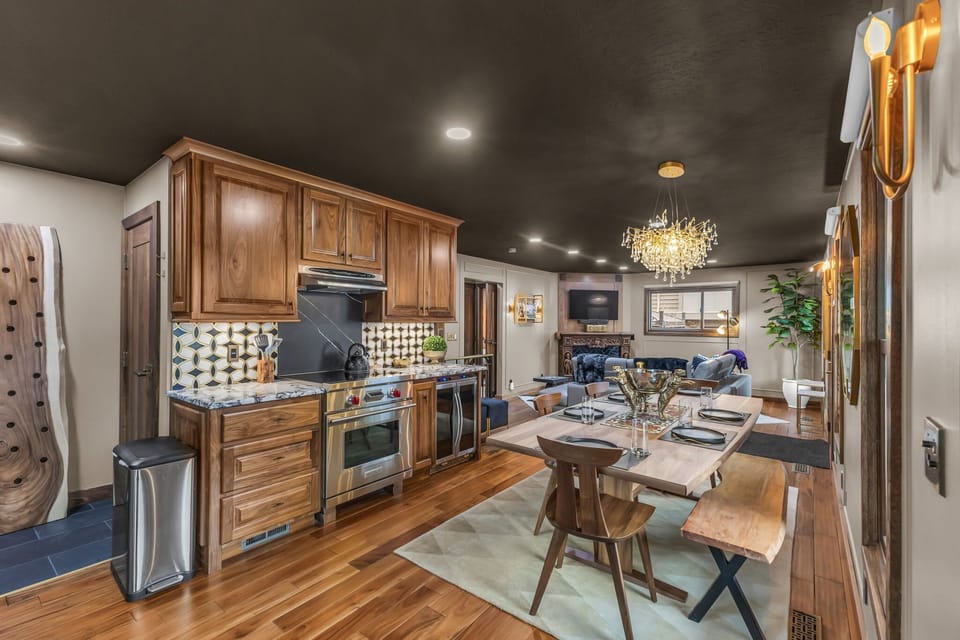 Kitchen: Main floor, drip coffee maker, Keurig, toaster, cooking utensils, tableware