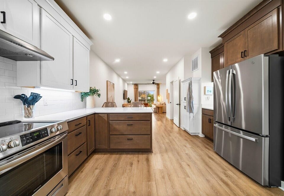 Bright, open-concept kitchen with stainless appliances and plenty of counter space.