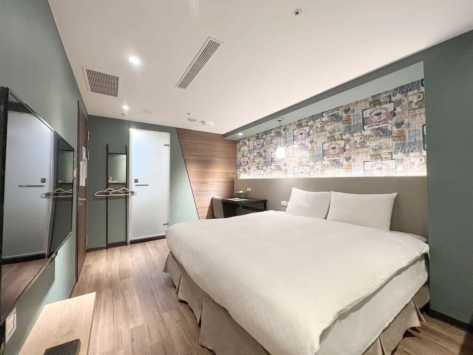 Deluxe Double Room, No Windows | Down comforters, blackout drapes, free WiFi, bed sheets