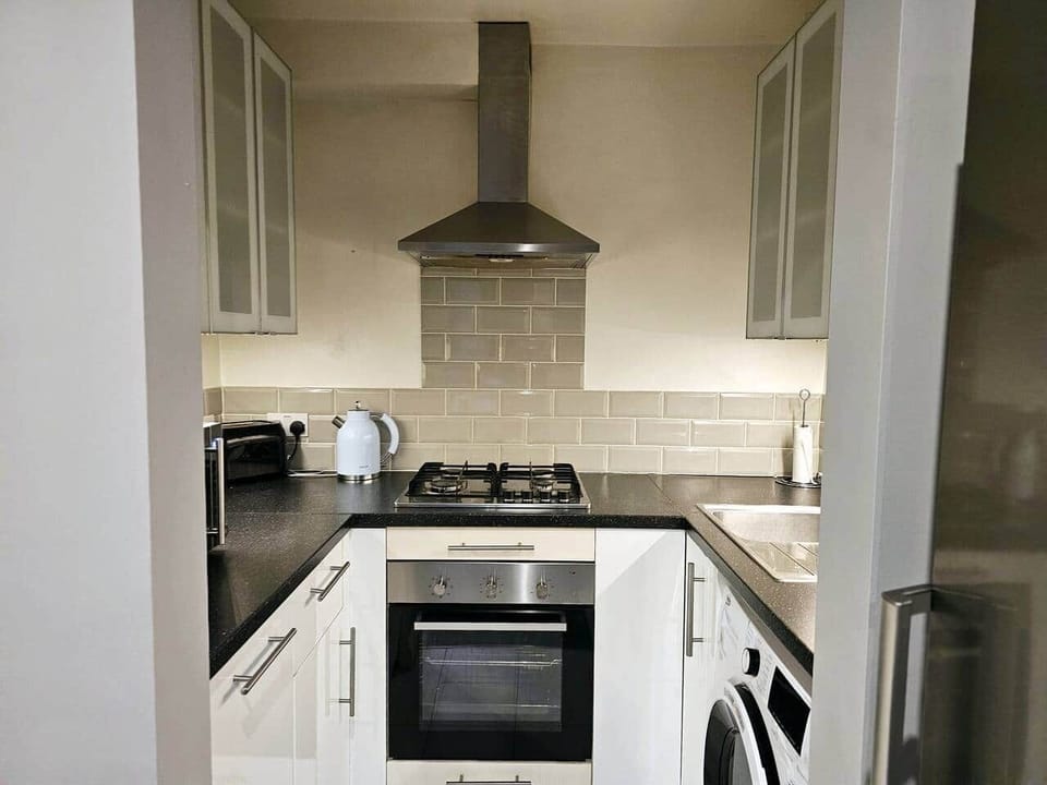 Cooker, hob, microwave, dishwasher, washing machine, toaster, kettle, fridge freezer with iced water