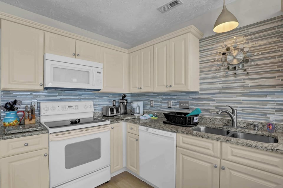 Fully equipped kitchen with all the essentials for your beach getaway.