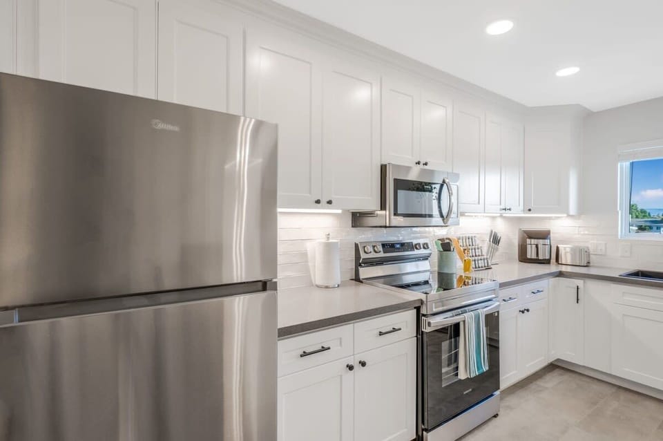 Stainless steel appliances in kitchen