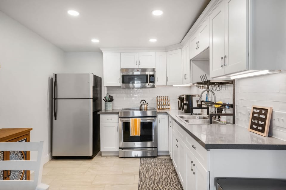 Fully stocked kitchen with stainless steel appliances