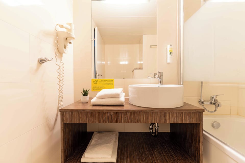 Hair dryer, towels, soap, shampoo