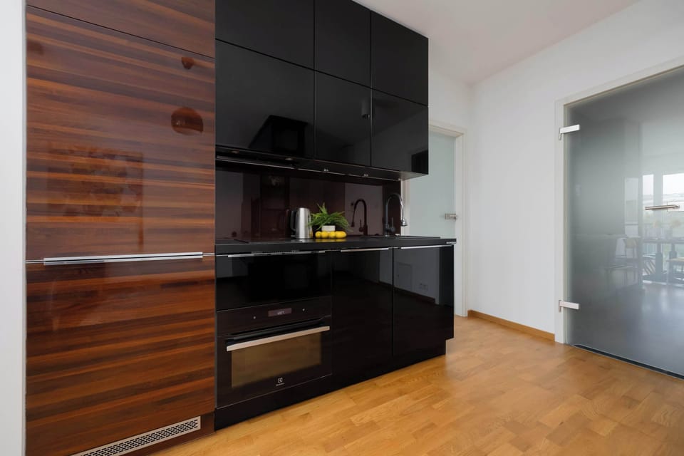 A glossy wooden cabinet in the living room.