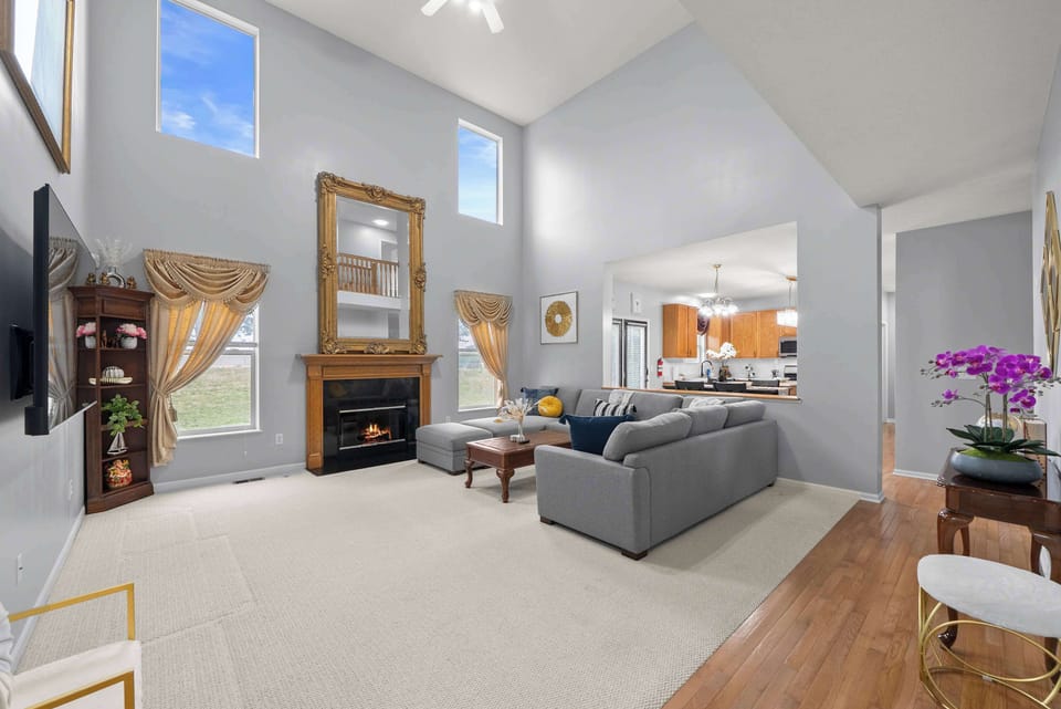 Curl up in the sophisticated living room & stream your favorites on the smart TV​