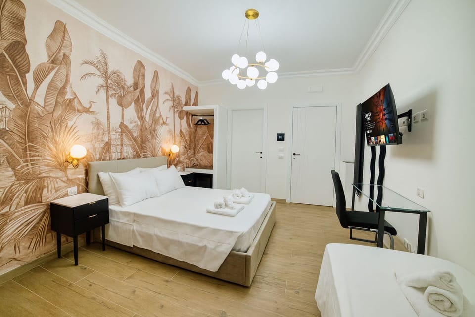 Deluxe Triple Room | Desk, free WiFi