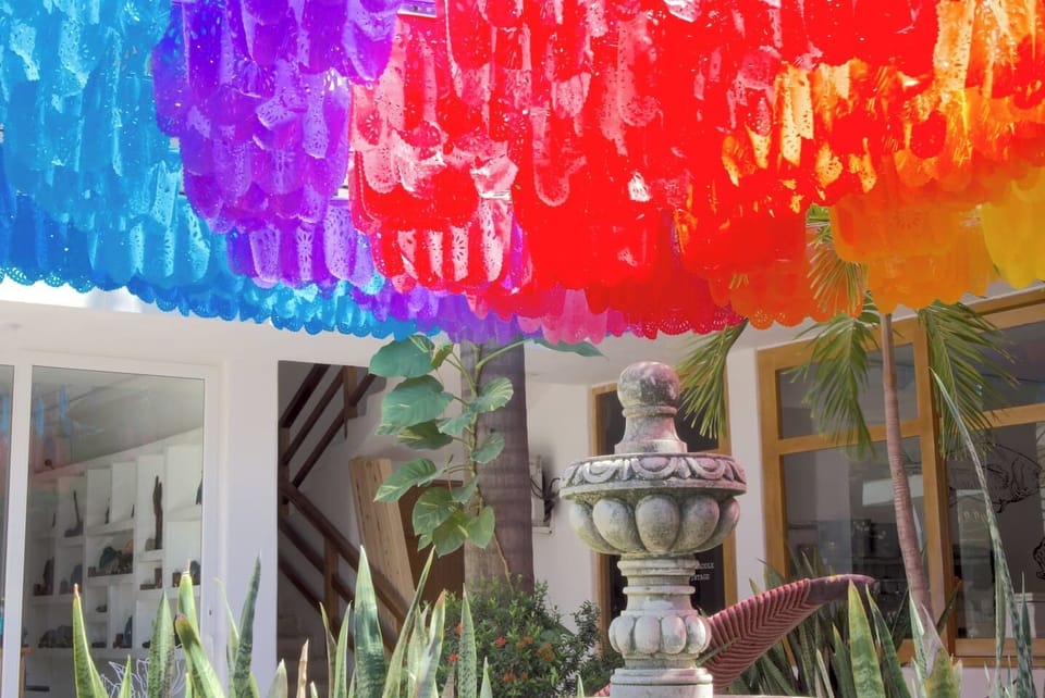 Mexican banderas hang over our fountain