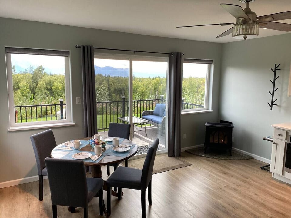 Dining, Deck, Fireplace and Mountain Views