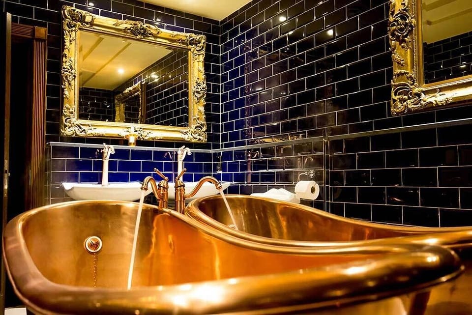 Deluxe Room | Premium bedding, in-room safe, desk, iron/ironing board