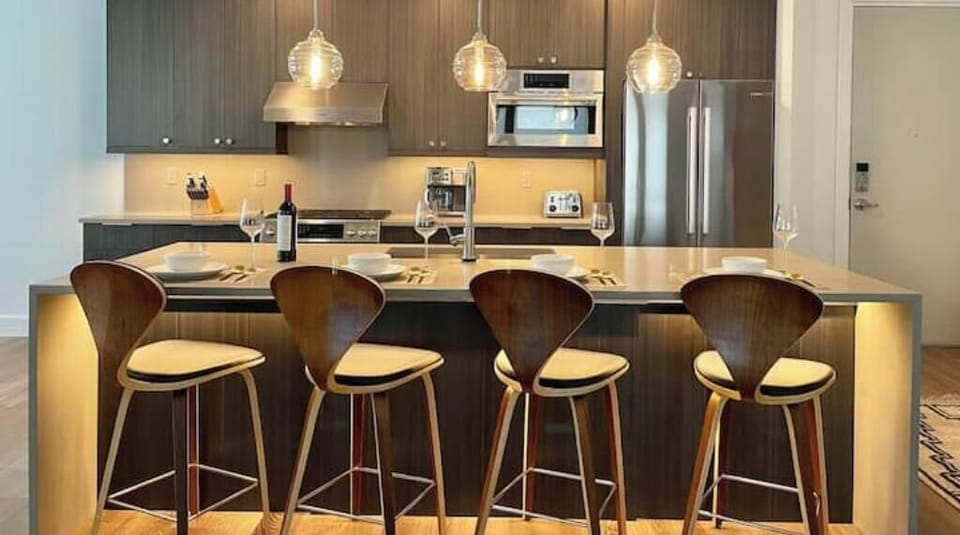 Kitchen with eat-in island. 