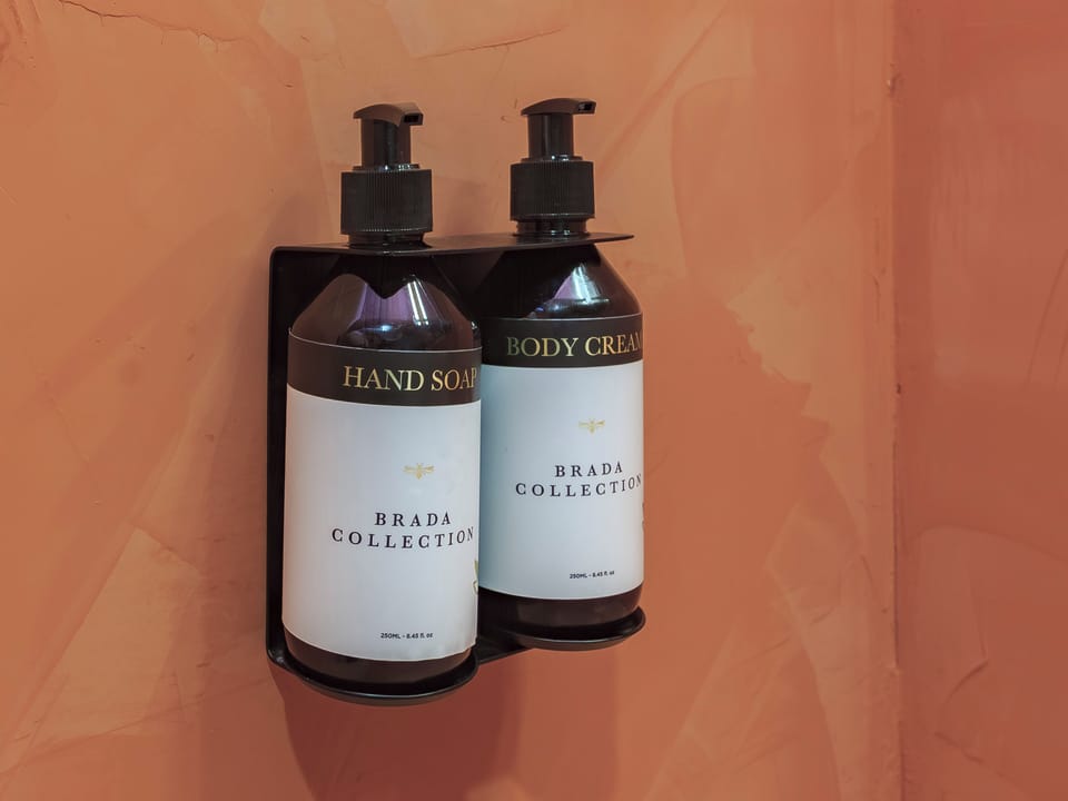 Junior Suite | Bathroom | Shower, rainfall showerhead, hair dryer, bathrobes