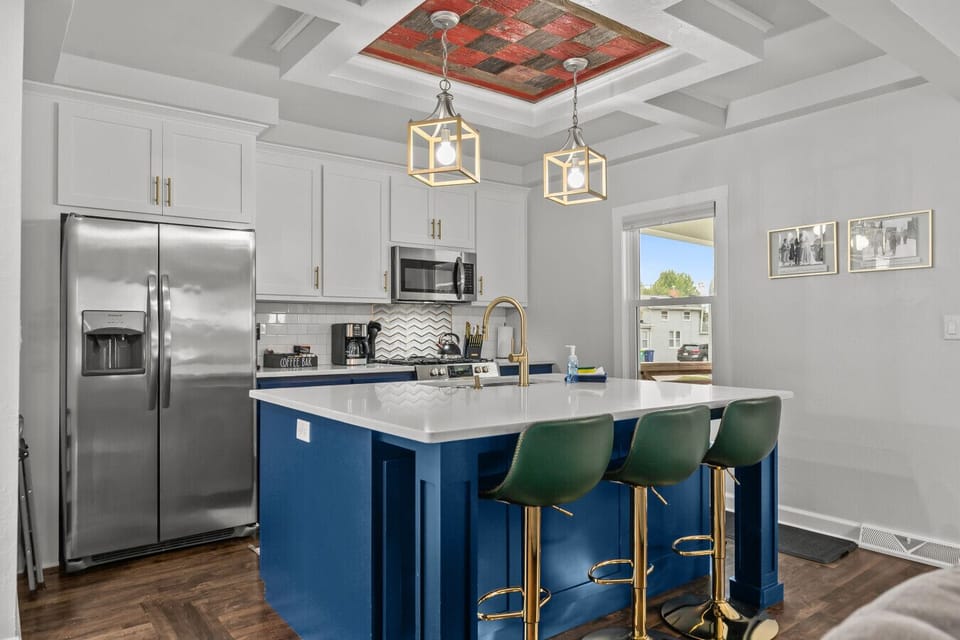 Fully stocked kitchen with island seating for your crew.