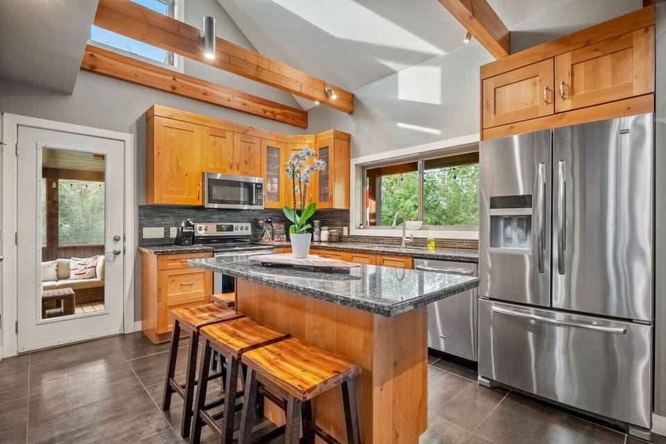 Full kitchen with drip & Keurig coffee makers, blender, Insta Pot, and essentials (ground coffee, tea, sugar, ketchup, mustard & relish.)