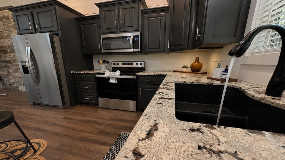 Fully Equipped Kitchen with Granite Counters & Modern Appliances