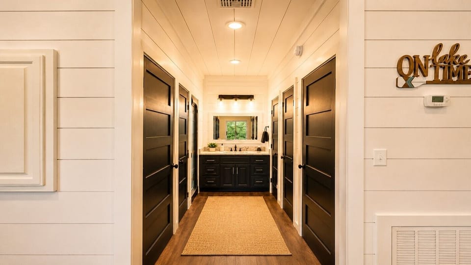 Spacious Cabin Hallway with Double Vanity & Bedroom Access