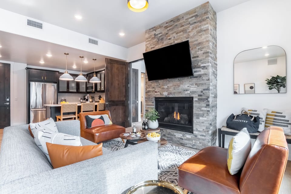The perfect place for movie nights with a fireplace and TV.