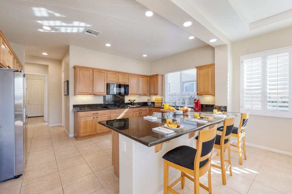 Barstool seating in the kitchen.