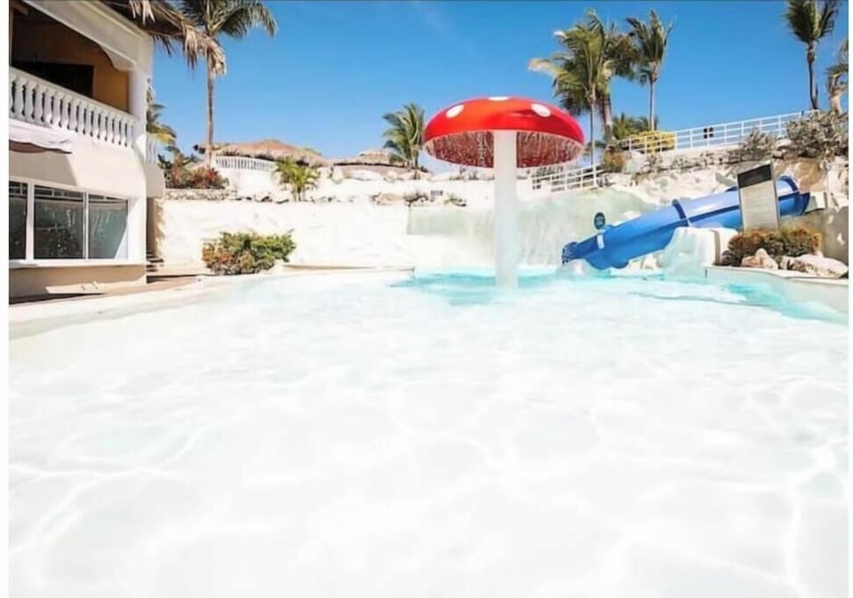 Family Friendly pool with waterslide.