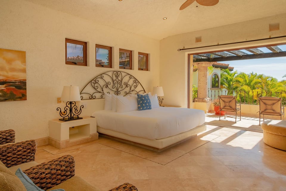 Bedroom with ocean view balcony