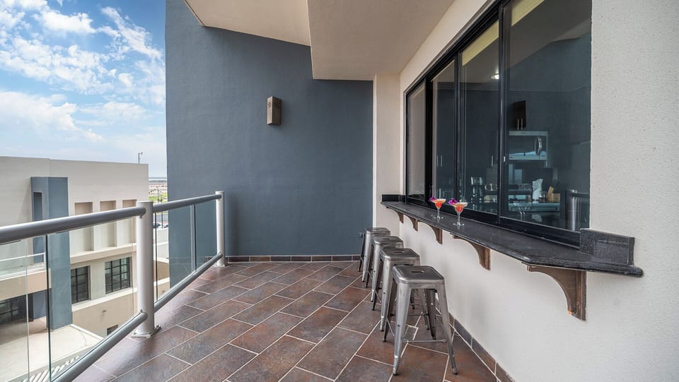 Second balcony off of the kitchen with great bar area