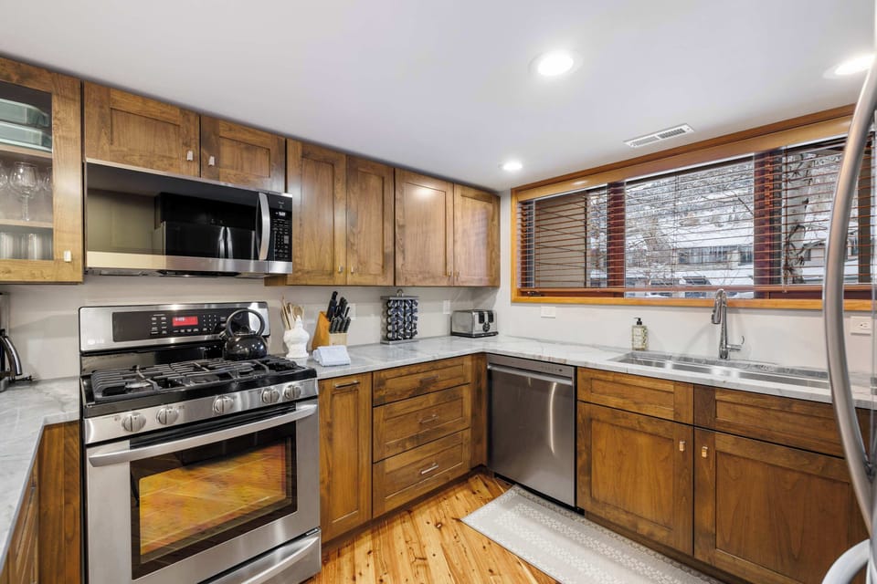 Recently renovated, fully stocked kitchen for home-cooked meals.
