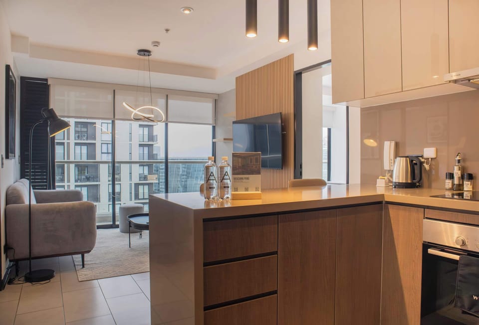 Open-plan living area with natural light and city views.