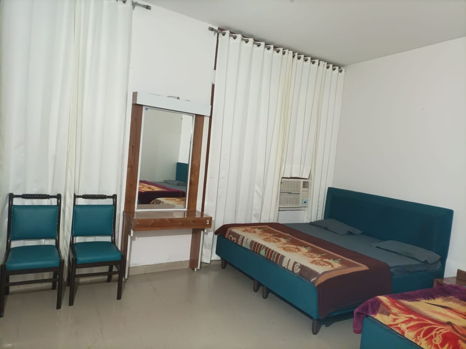 Family Studio Suite, City View | Rollaway beds, free WiFi, bed sheets