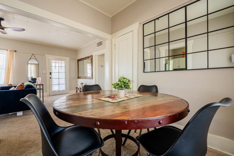Conversation-ready round table under soft light.