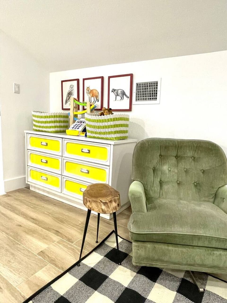 Sitting area and dresser full of toys for kids