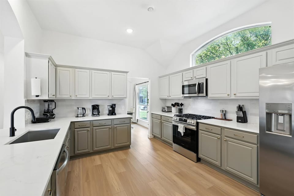 With stainless steel appliances, plenty of countertop space, and cooking essentials, this kitchen is just waiting for you to cook up your favorite meals!