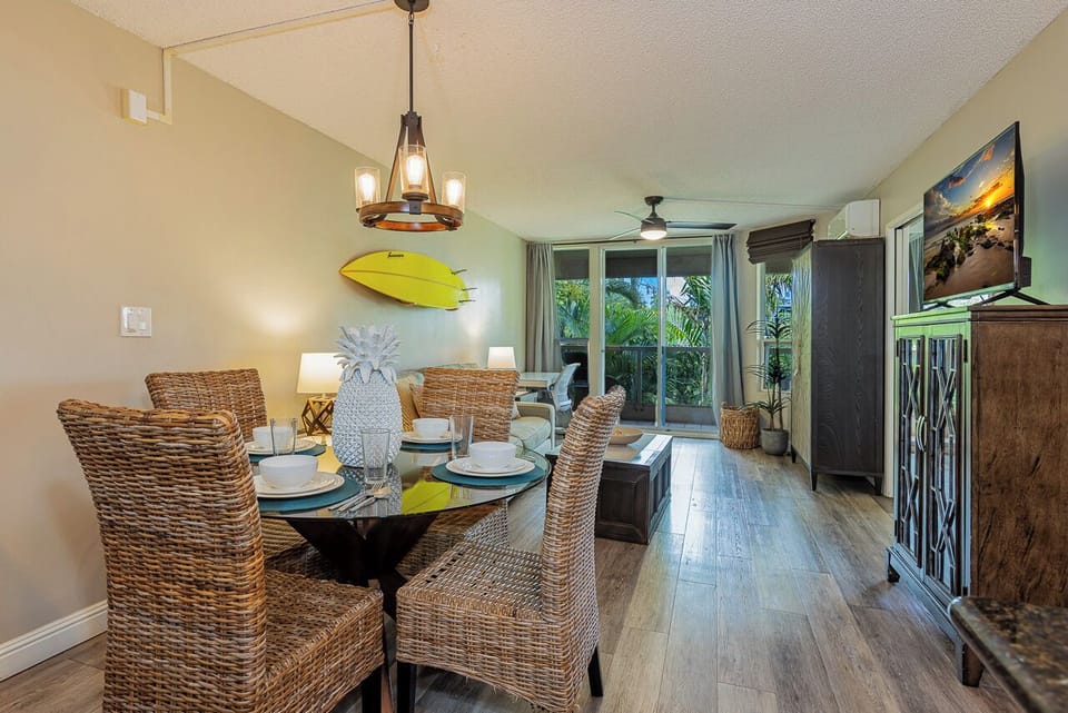 Modern island dining with surf art and pineapple accents