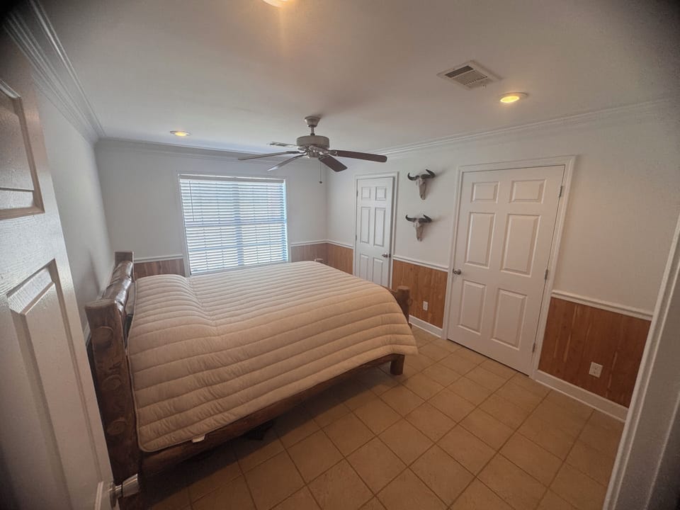Queen size bed with 1/2 bath attached.