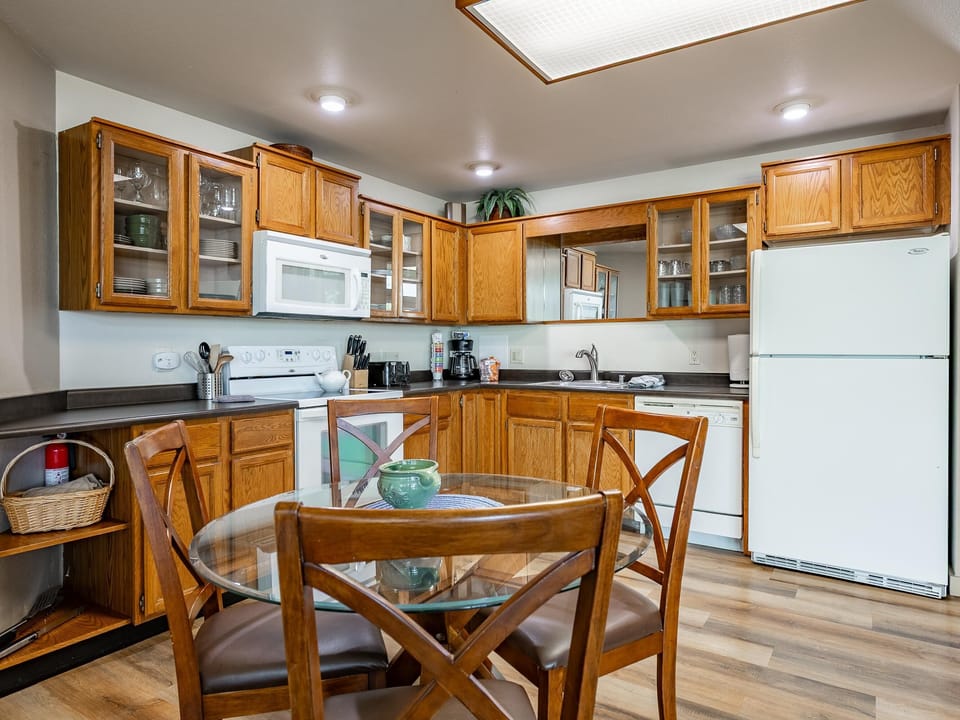 Cozy kitchen with warm wood cabinets and bright skylight