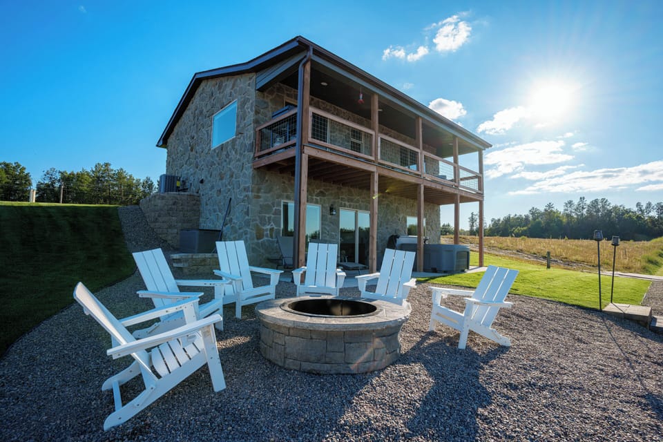 Enjoy the new Fire pit with stunning views of Sunset Lake.  We provide firewood!