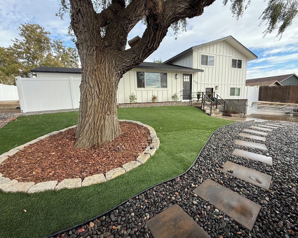 Large Fenced in Backyard with turf, professionally landscaped