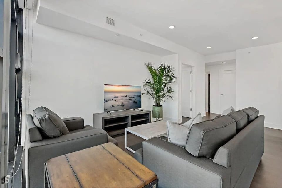 Living area with smart TV and comfortable seating
