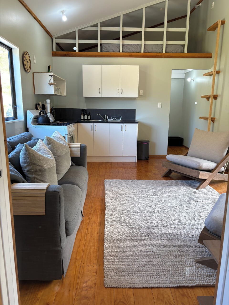 view of the other mezzanine floor that sleeps 2 and kitchen.