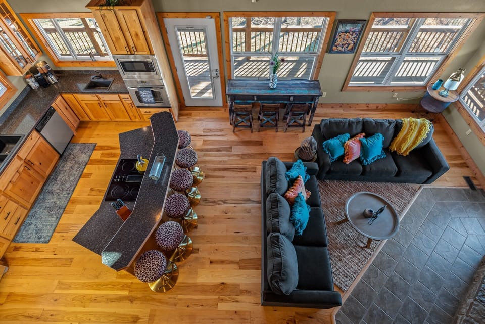 Gather for meals around the farmhouse table with mountain views out every window.