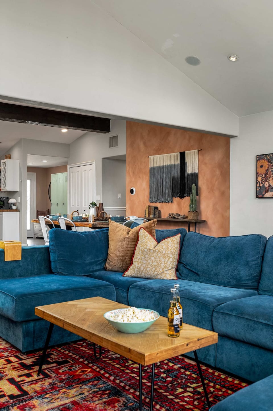 Living room 1 with ceiling fan, TV, large windows