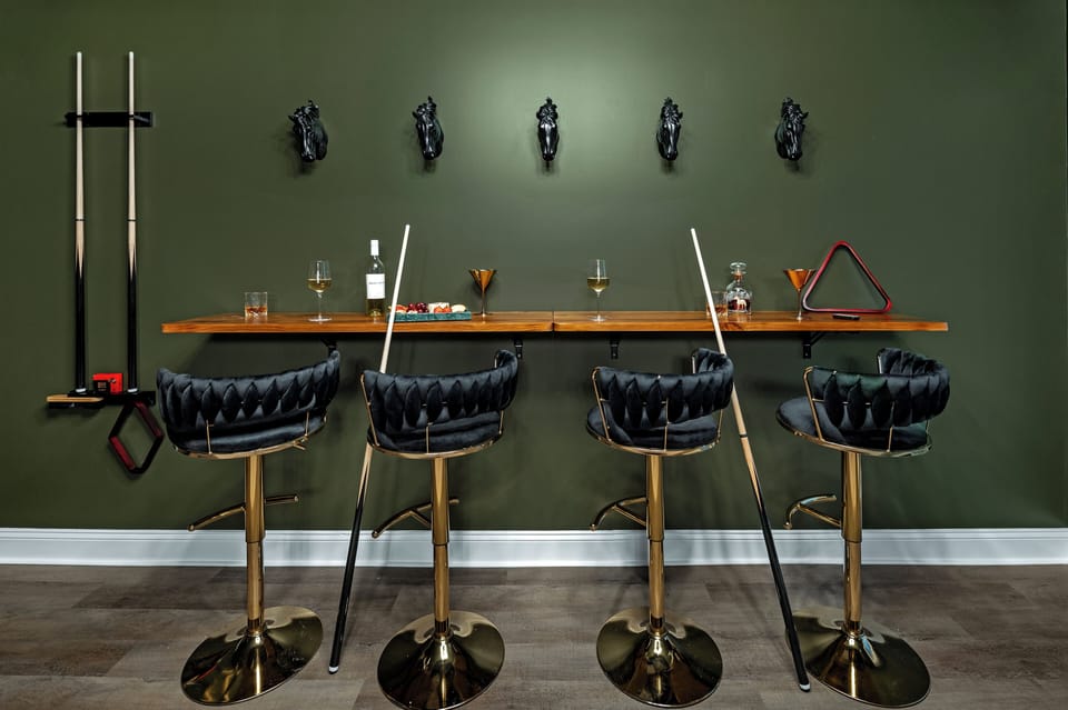 Settle into the lounge where the drinks flow, the cards shuffle, and the night unfolds in good company