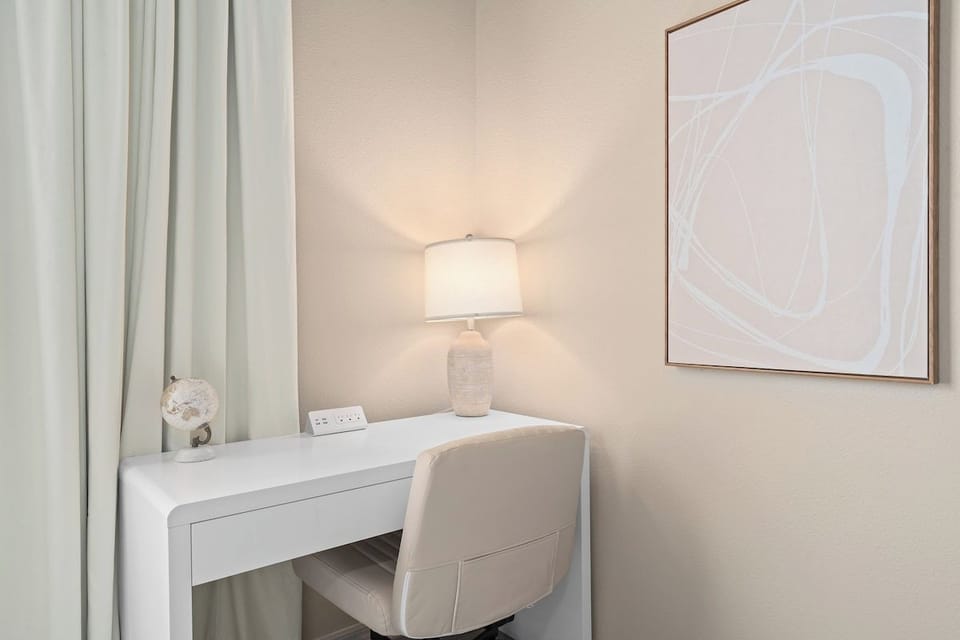 Quiet desk nook - a spot to plug in without leaving the bedroom.