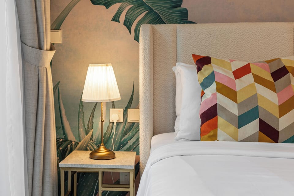 Superior Studio Suite, City View | In-room safe, desk, laptop workspace, iron/ironing board