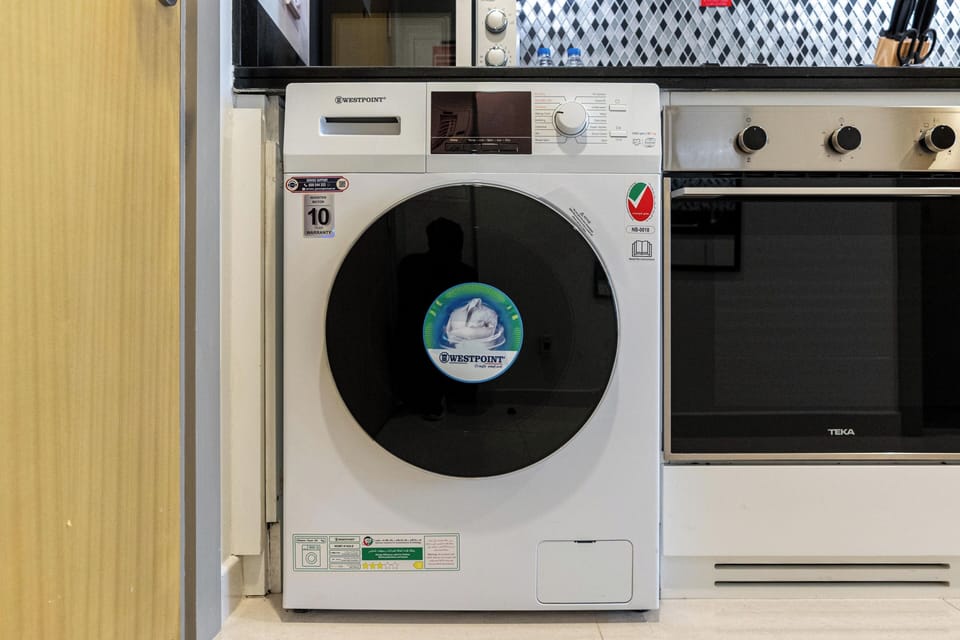 Superior Studio Suite, City View | Laundry